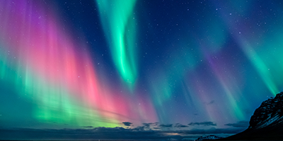 Green, blue, and pink northern lights